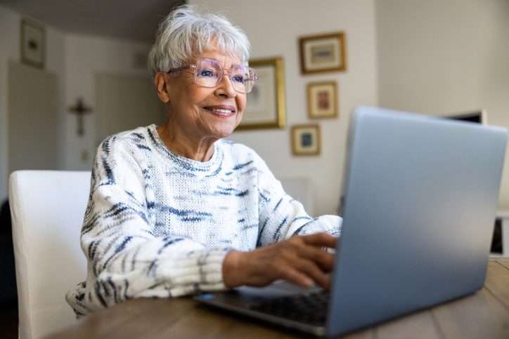 A beautiful senior woman using a laptop