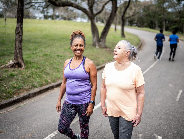 Senior women walking in a park